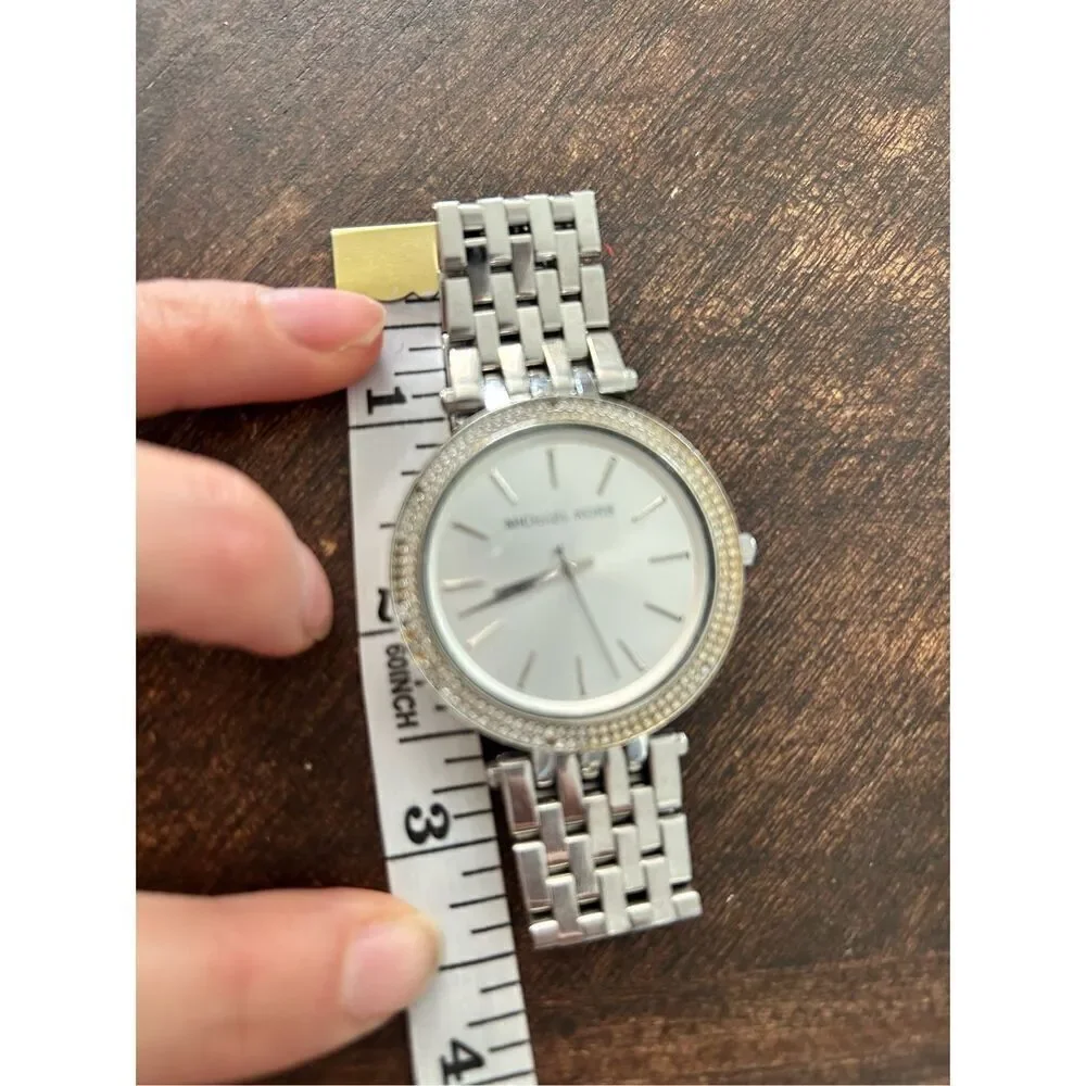 Michael Kors silver color faux diamond watch fits a small wrist 5 inches laying